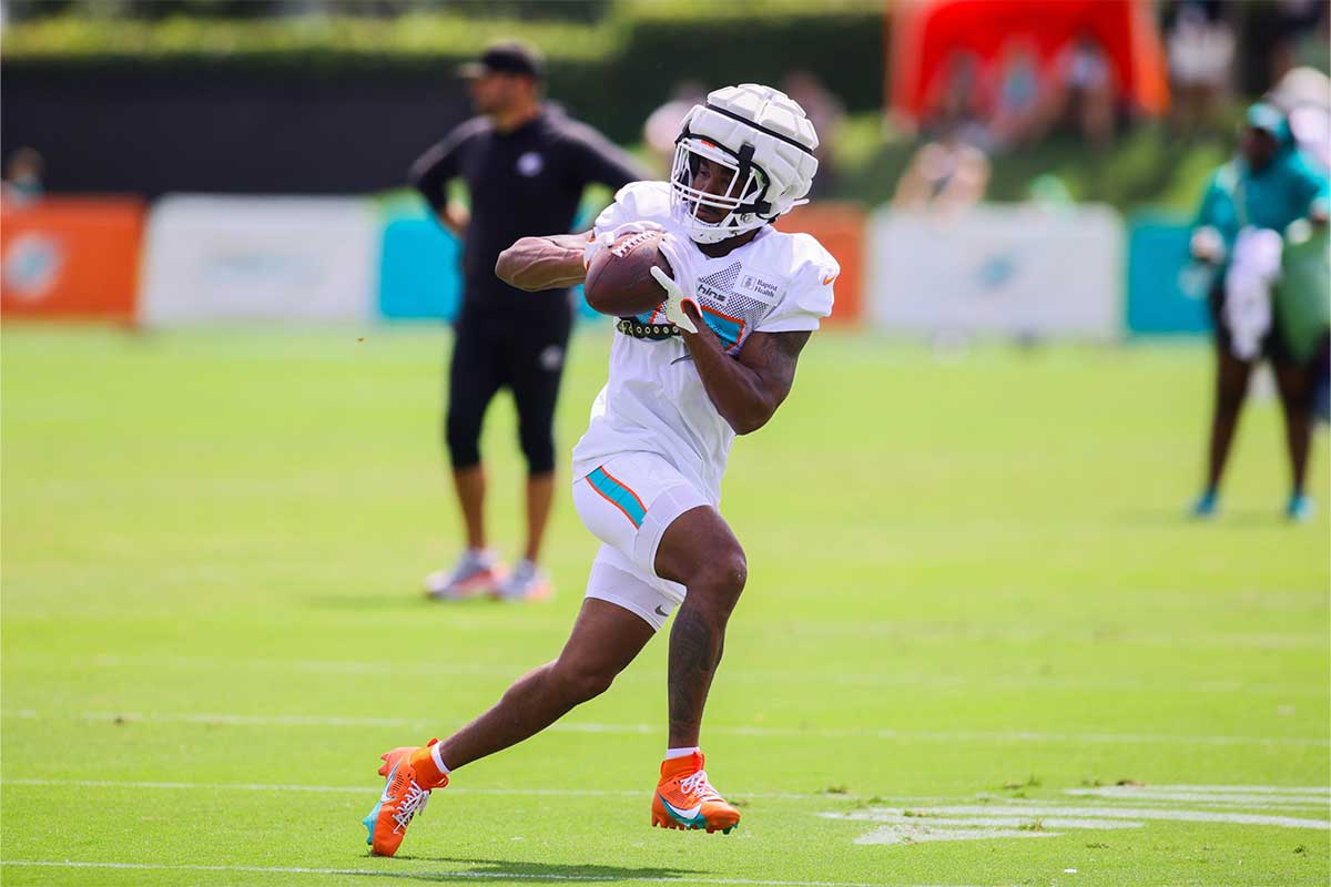 Miami Dolphins wide receiver Jaylen Waddle (17) catches the football during training camp at Baptist Health Training Complex.