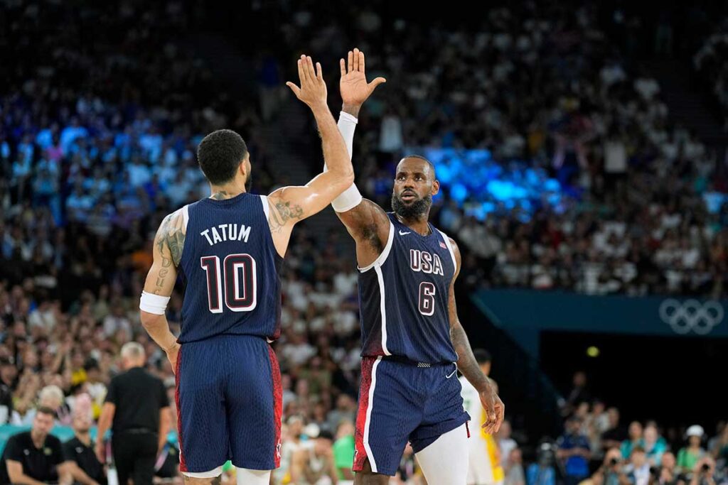 United States guard LeBron James (6) and small forward Jayson Tatum (10) react in the first half against Brazil in a men’s basketball quarterfinal game during the Paris 2024 Olympic Summer Games at Accor Arena. 