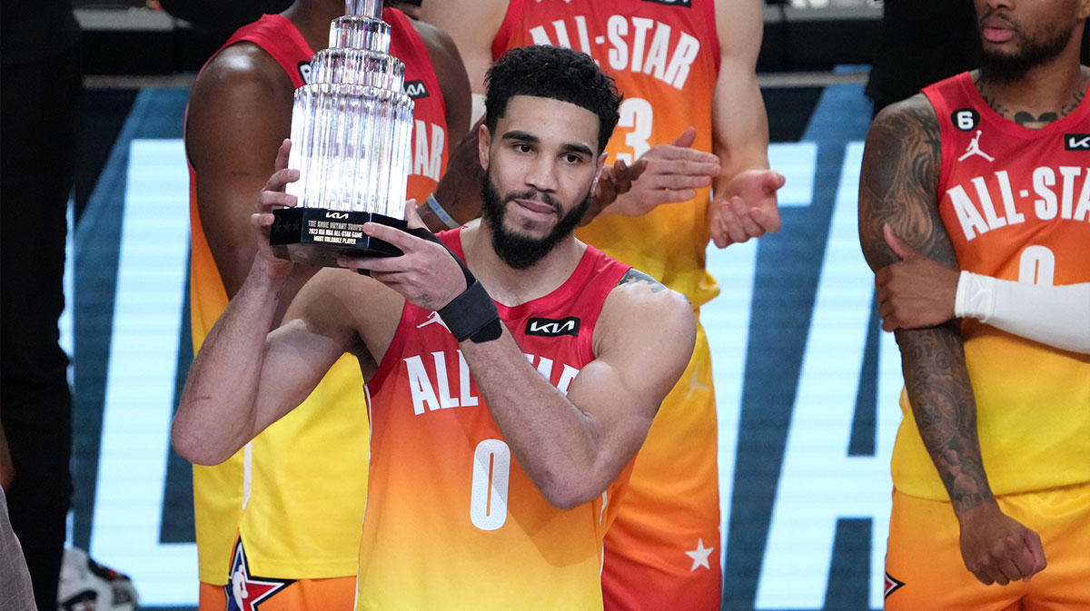 Jayson Tatum (0) holds the Kobe Bryant MVP Trophy after the 2023 NBA All-Star Game at Vivint Arena. 