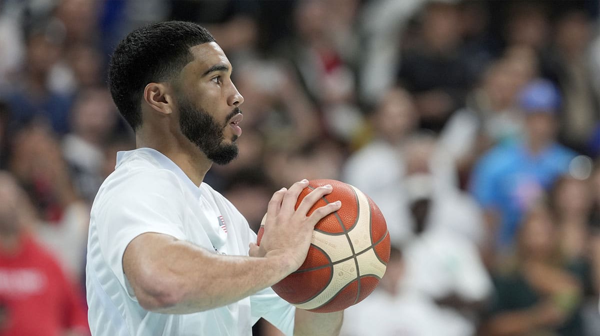 United States small forward Jayson Tatum (10) warms up before a game against Puerto Rico during the Paris 2024 Olympic Summer Games at Stade Pierre-Mauroy. 