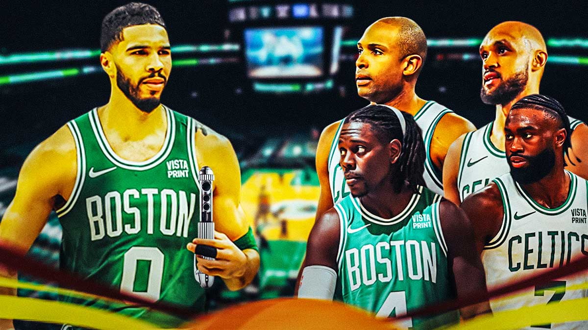Celtics' Jayson Tatum holding a Men in Black neuralyzer, with Jaylen Brown, Jrue Holiday, Derrick White, and Al Horford beside him