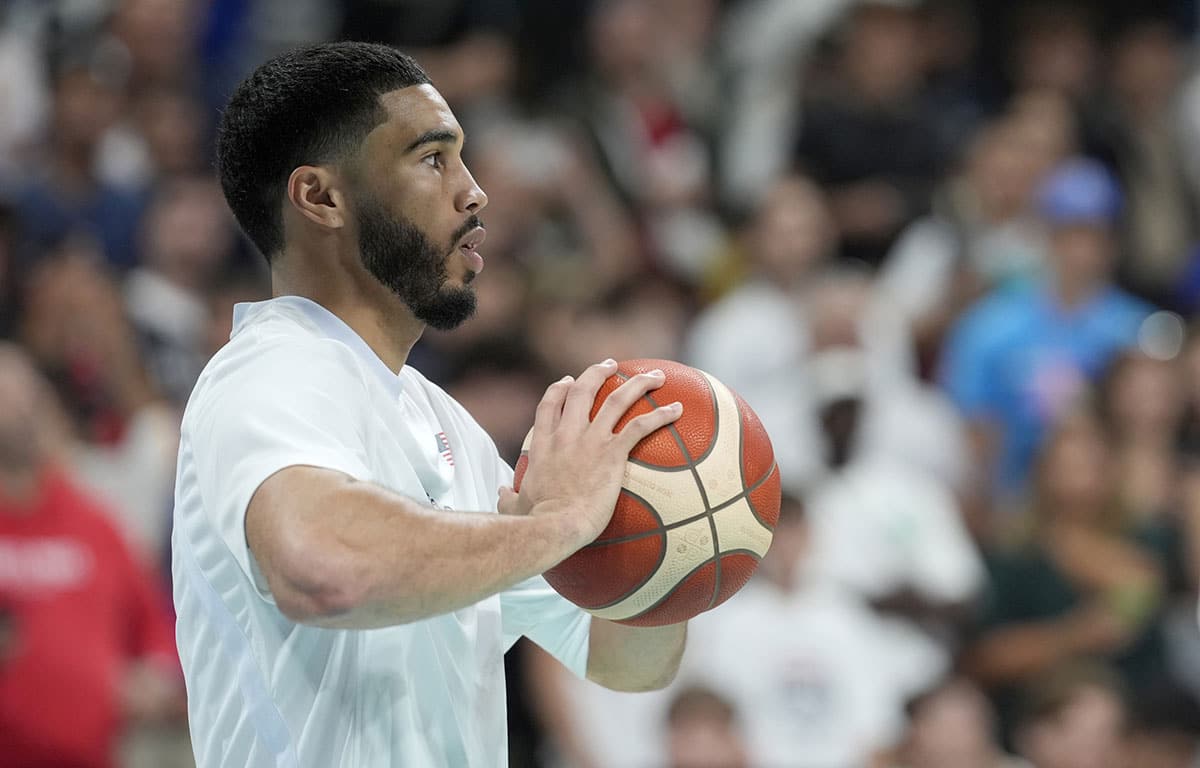 United States small forward Jayson Tatum (10) warms up before a game against Puerto Rico during the Paris 2024 Olympic Summer Games at Stade Pierre-Mauroy.