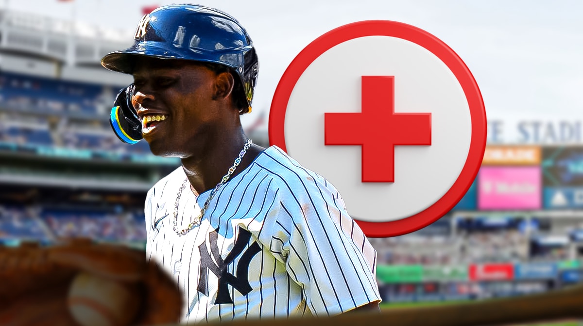 Jazz Chisholm in Yankees gear smiling next to medical sign