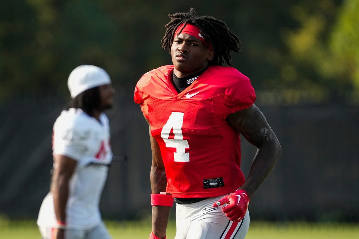 Aug 8, 2024; Columbus, Ohio, USA; Ohio State Buckeyes wide receiver Jeremiah Smith (4) runs during football practice at the Woody Hayes Athletic Complex.