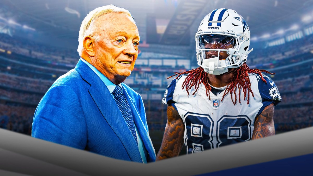 Jerry Jones smiles next to CeeDee Lamb