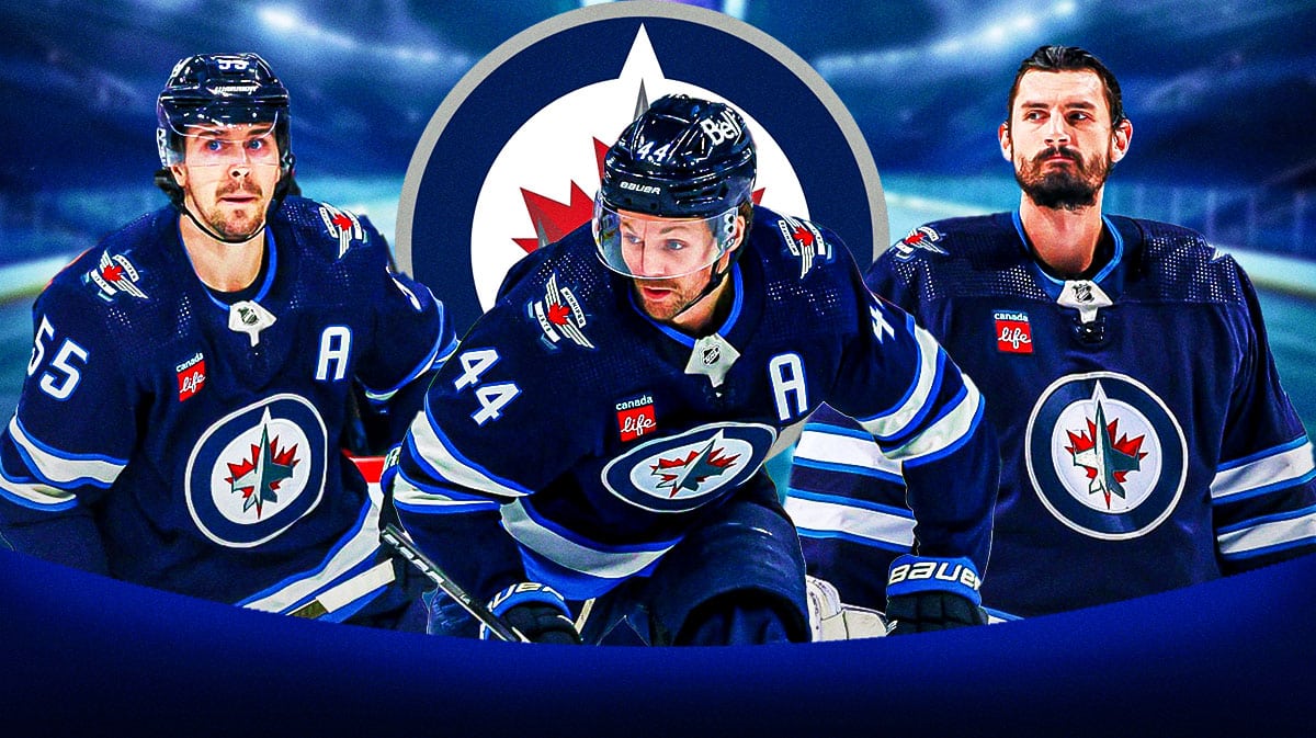 Mark Scheifele, Connor Hellebuyck, and Josh Morrissey in front of a winnipeg jets logo.