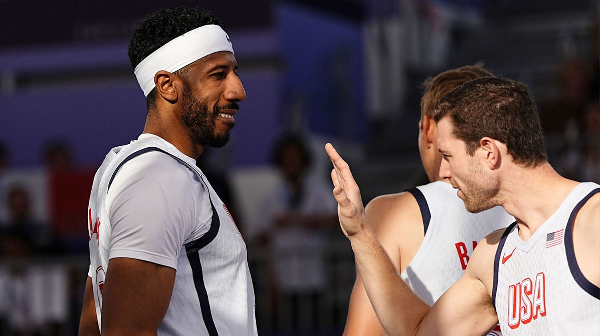 United States player Kareem Maddox (9) and player Jimmer Fredette (5) high five before the game against the Netherlands during the Paris 2024 Olympic Summer Games at La Concorde 1.