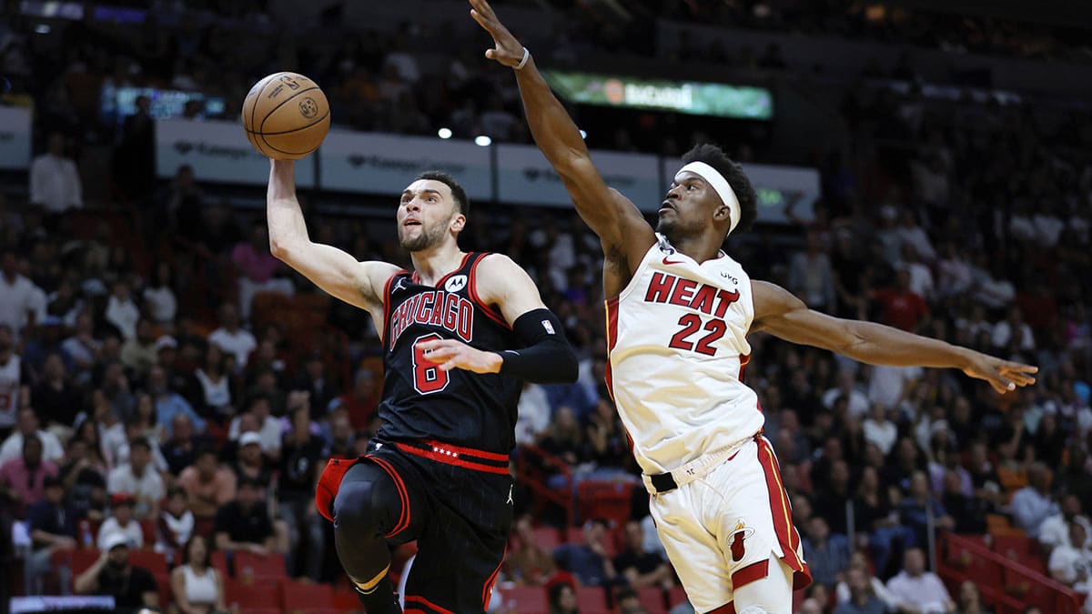 Chicago Bulls guard Zach LaVine (8) drives to the basket ahead of Miami Heat forward Jimmy Butler (22) during the third quarter at Kaseya Center.