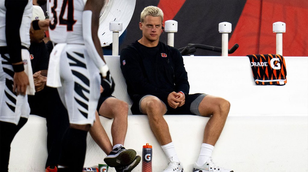 Cincinnati Bengals quarterback Joe Burrow (9) sits on the bench in the first quarter of the NFL preseason game between the Cincinnati Bengals and the Indianapolis Colts at Paycor Stadium in Cincinnati on Thursday, Aug. 22, 2024.