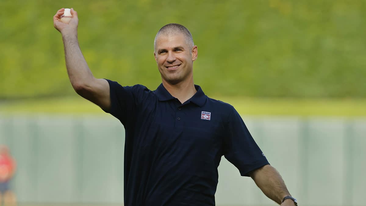 Minnesota Twins former player Joe Mauer throws a ceremonial pitch as the team honors his recent induction into the Baseball Hall of Fame before a game against the Chicago White Sox at Target Field.
