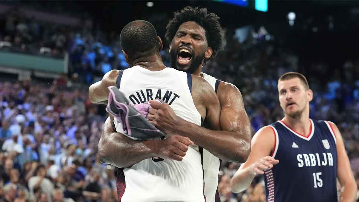 United States centre Joel Embiid (11) and guard Kevin Durant (7) celebrate after the game against Serbia in a men's basketball semifinal game during the Paris 2024 Olympic Summer Games at Accor Arena.