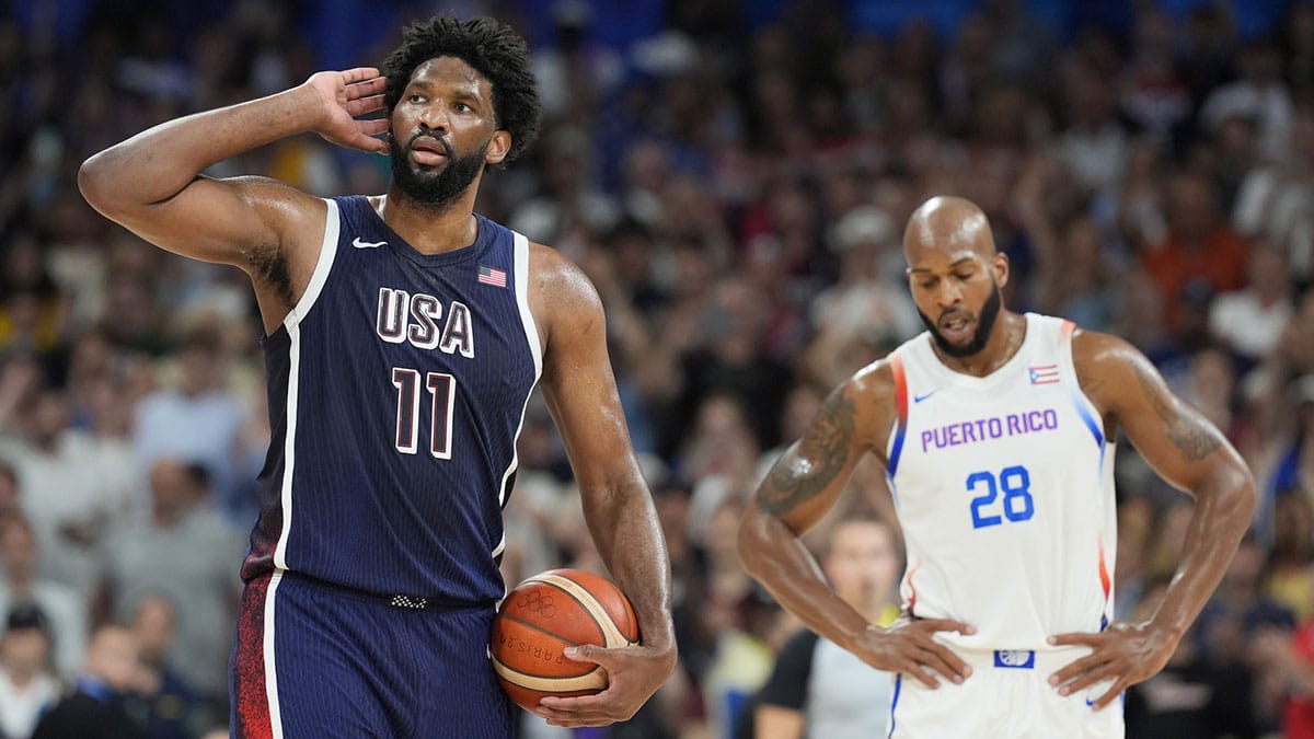 United States center Joel Embiid (11) gestures to the crowd in the fourth quarter against Puerto Rico during the Paris 2024 Olympic Summer Games at Stade Pierre-Mauroy.