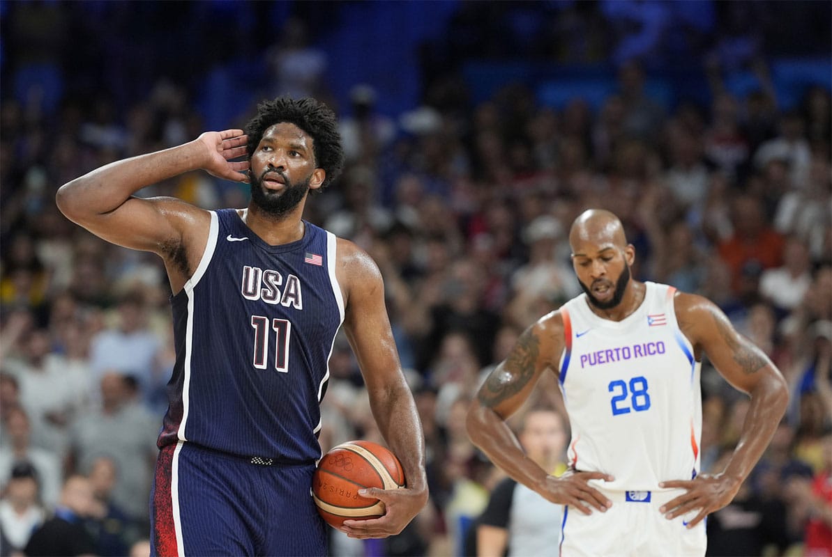 United States center Joel Embiid (11) gestures to the crowd in the fourth quarter against Puerto Rico during the Paris 2024 Olympic Summer Games at Stade Pierre-Mauroy. 