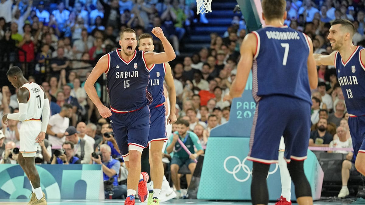 Serbia power forward Nikola Jokic (15) reacts after a play against Germany in the men's basketball bronze medal game during the Paris 2024 Olympic Summer Games at Accor Arena.