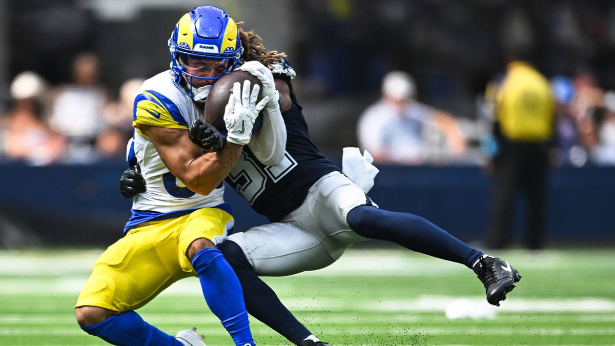 Dallas Cowboys cornerback Josh Butler (31) tackles Los Angeles Rams wide receiver Jordan Whittington (88) during the third quarter at SoFi Stadium.