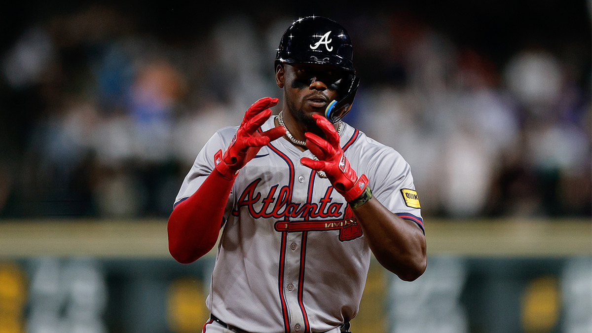 Atlanta Braves right fielder Jorge Soler (2) gestures as he rounds the bases on a solo home run in the eighth inning against the Colorado Rockies at Coors Field.