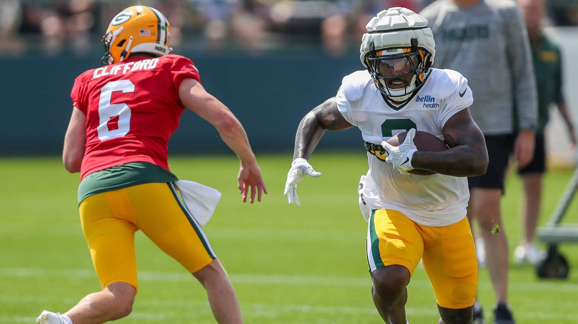 Green Bay Packers running back Josh Jacobs (8) runs through a drill on Saturday, July 27, 2024, at Ray Nitschke Field in Ashwaubenon, Wis