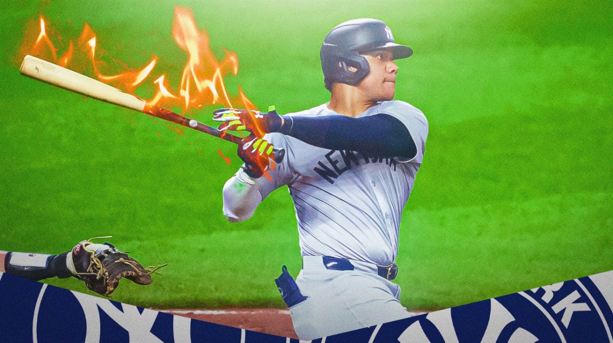 Juan Soto batting in a New York Yankees uniform with a flaming bat as Soto has been on fire with a career high in home runs and is second on the Yankees in home runs.