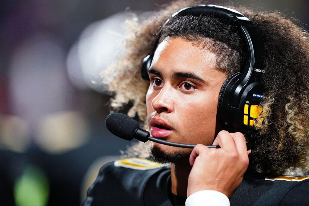 Carrollton Trojans quarterback Julian Lewis (10) watches on from the sidelines against the Westlake Lions during the first half at Grisham Stadium. The 15-year-old Carrollton High student has already committed to playing for the University of Southern California Trojans and has been considered one of the top high school quarterback prospects.