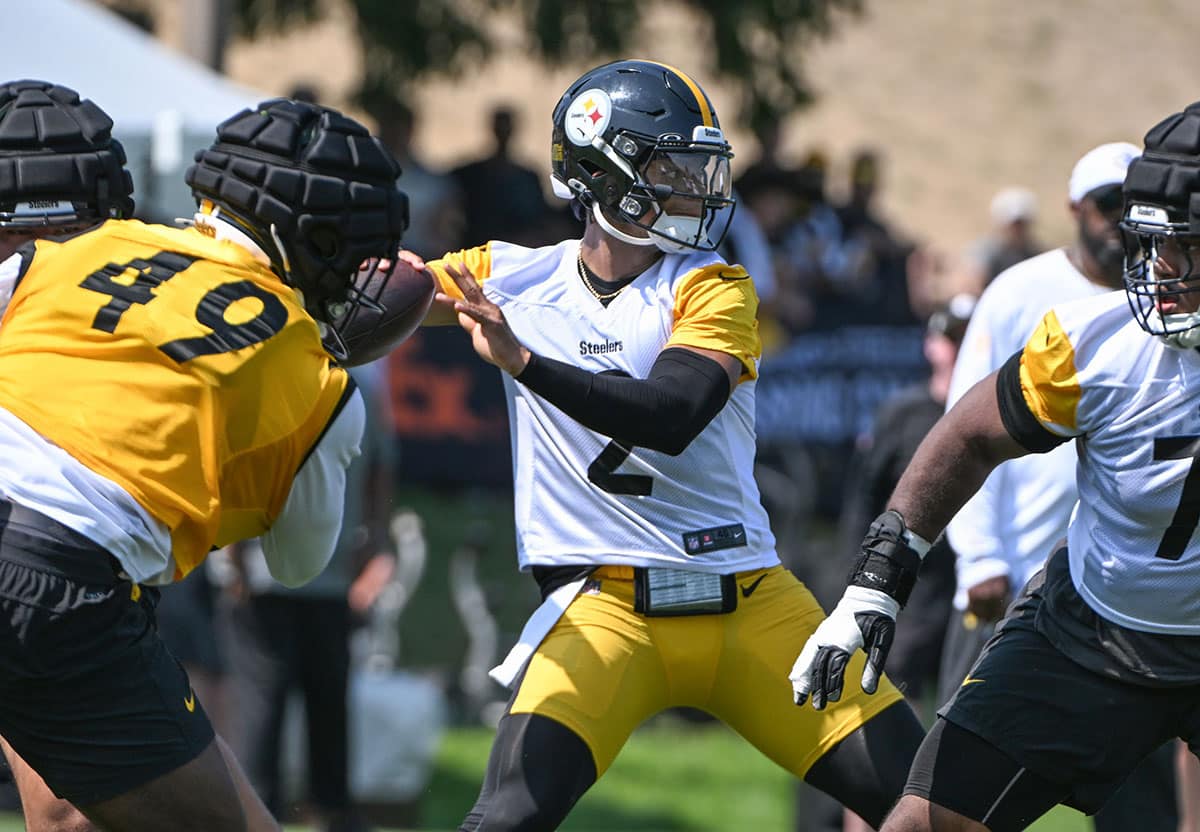 Pittsburgh Steelers quarterback Justin Fields participates in drills during training camp at Saint Vincent College.