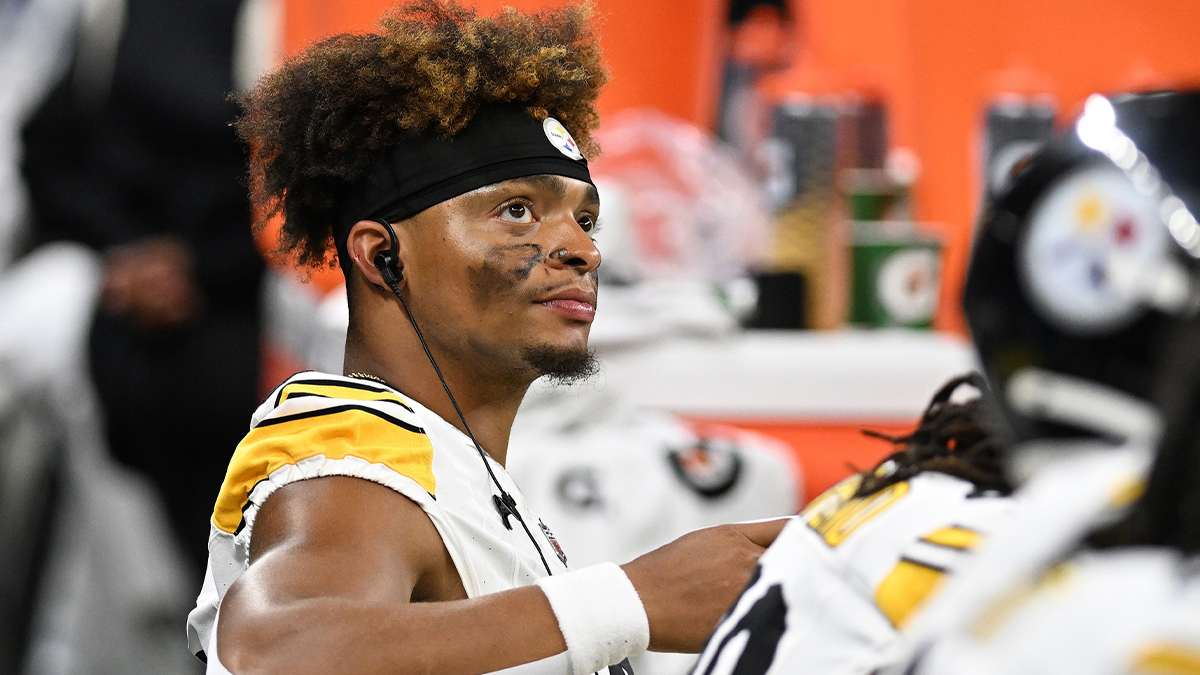 Pittsburgh Steelers quarterback Justin Fields (2) looks at the scoreboard while sitting on the bench during the Steelers pre-season game against the Detroit Lions in the third quarter at Ford Field.