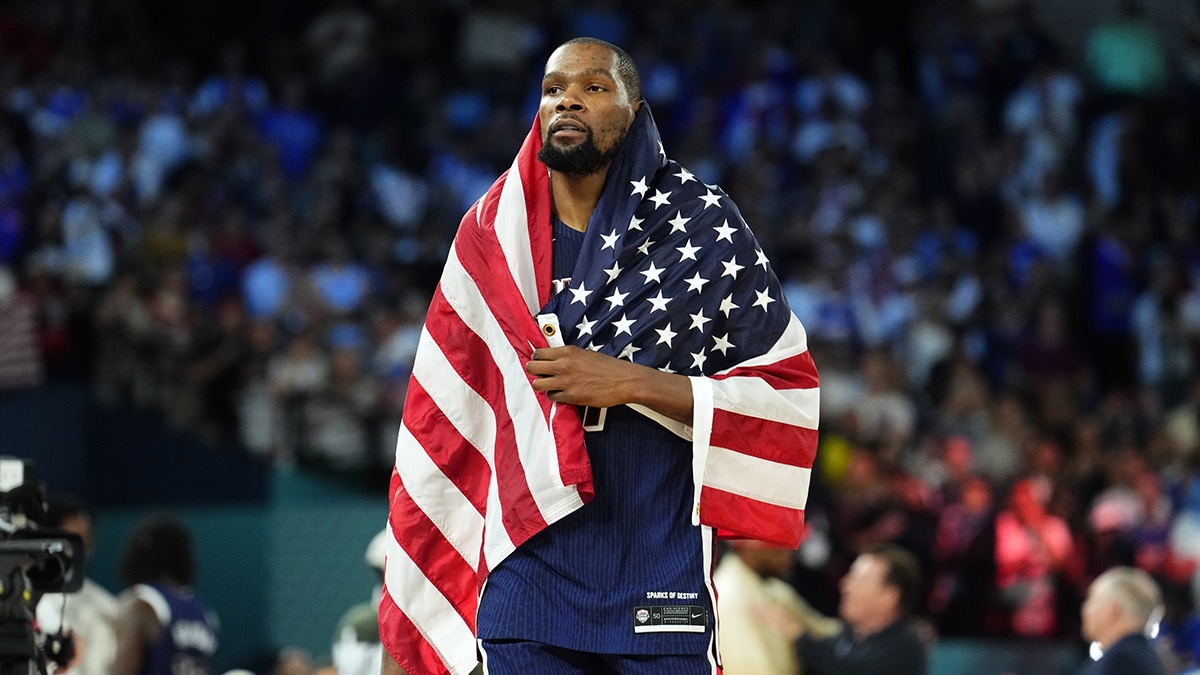 United States guard Kevin Durant (7) celebrates after defeating France in the men's basketball gold medal game during the Paris 2024 Olympic Summer Games at Accor Arena.