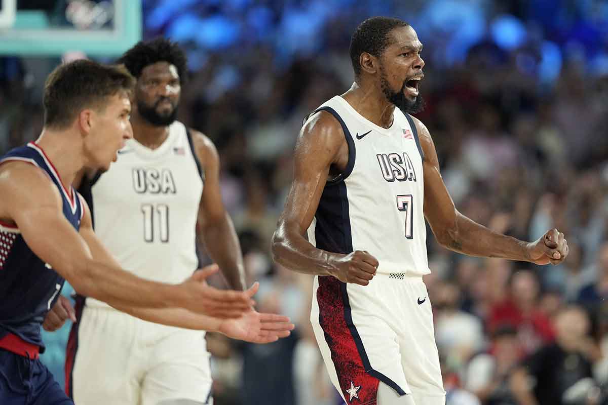 United States guard Kevin Durant (7) celebrates during the second half against Serbia in a men's basketball semifinal game during the Paris 2024 Olympic Summer Games at Accor Arena