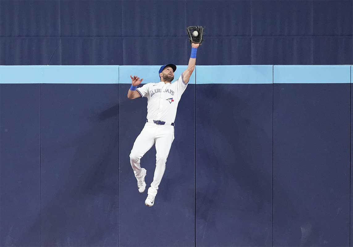 Jun 30, 2024; Toronto, Ontario, CAN; Toronto Blue Jays center fielder Kevin Kiermaier (39) catches a fly ball for the second out against the New York Yankees during the eighth inning at Rogers Centre. 