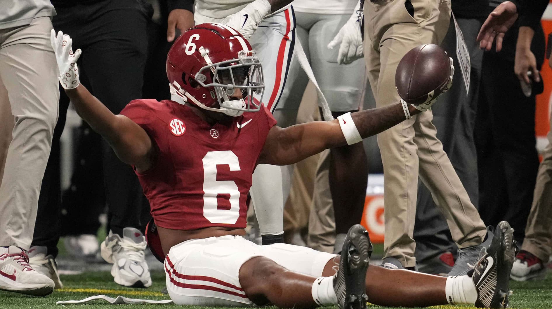 Alabama Crimson Tide wide receiver Kobe Prentice (6) reacts against the Georgia Bulldogs during the first half in the SEC Championship game at Mercedes-Benz Stadium.