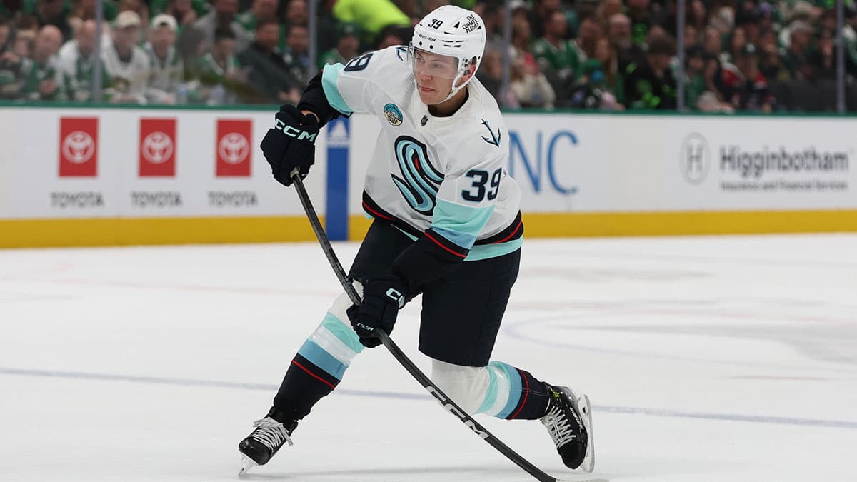 Seattle Kraken defenseman Ryker Evans (39) shoots the puck against the Dallas Stars in the first period at American Airlines Center.