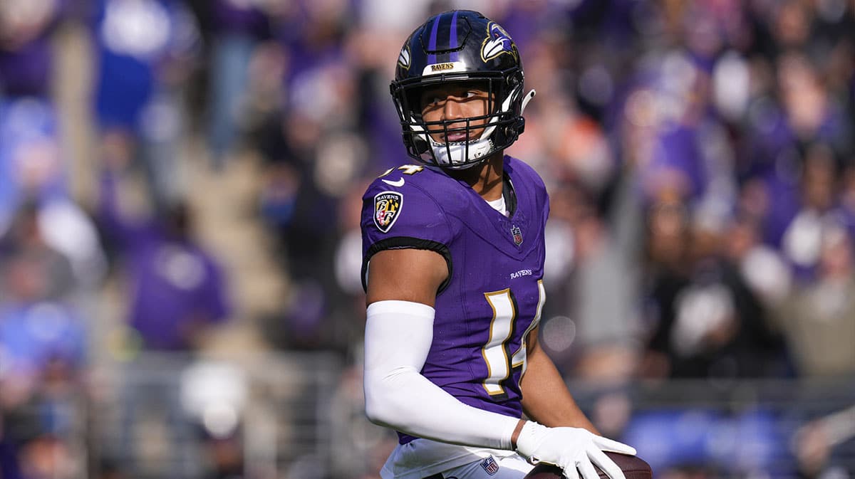 Baltimore Ravens safety Kyle Hamilton (14) celebrates after scoring a touchdown against the Cleveland Browns during the first quarter at M&T Bank Stadium.