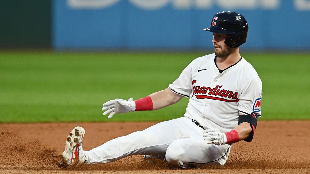  Cleveland Guardians center fielder Lane Thomas (8) slides into second with a double during the seventh inning against the Baltimore Orioles at Progressive Field.