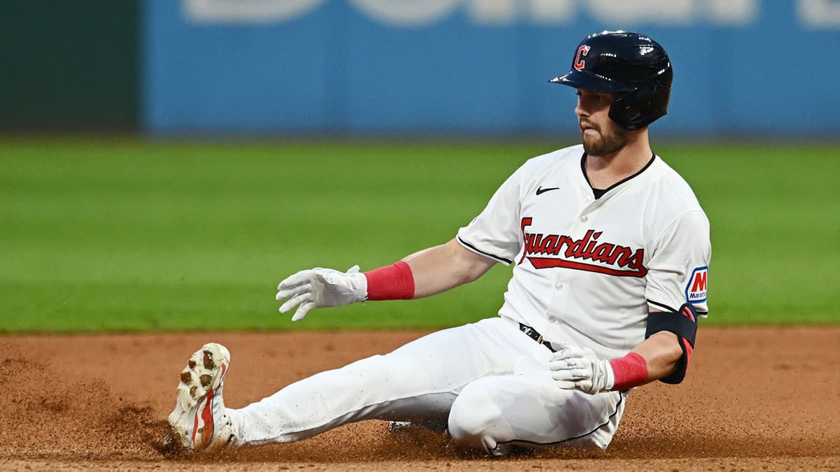 Cleveland Guardians center fielder Lane Thomas (8) slides into second with a double during the seventh inning against the Baltimore Orioles at Progressive Field.