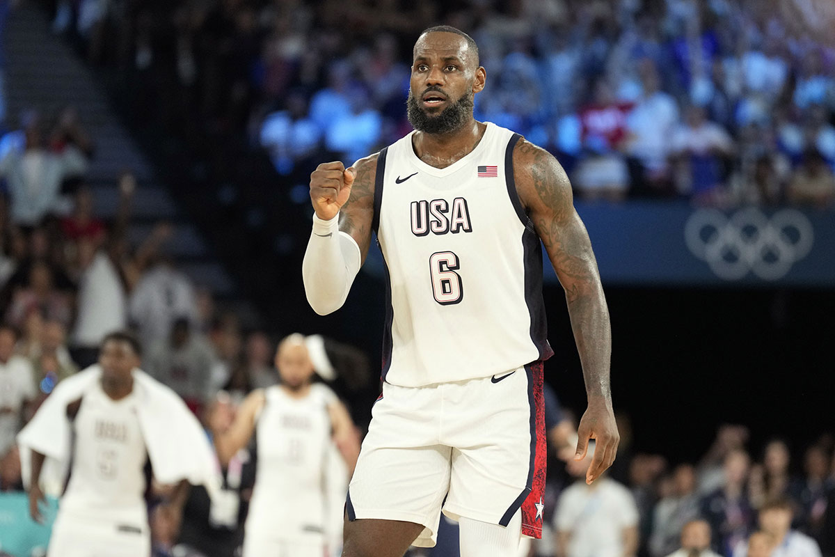 United States guard LeBron James (6) celebrates during the second half against Serbia in a men's basketball semifinal game during the Paris 2024 Olympic Summer Games at Accor Arena.