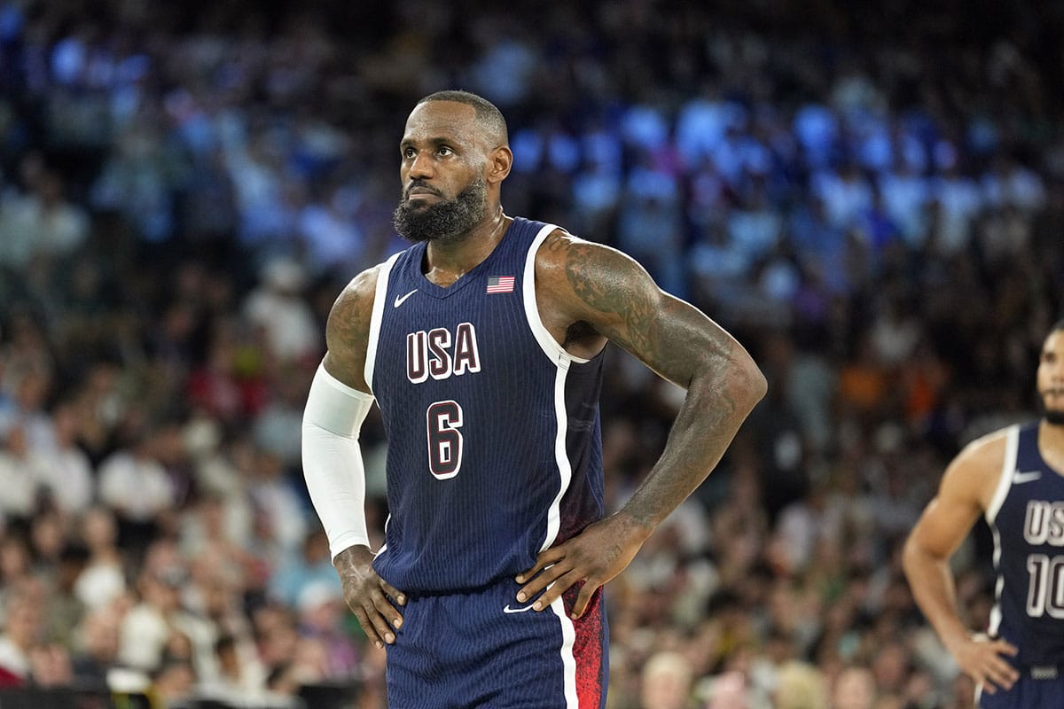 United States guard LeBron James (6) reacts in the first half against Brazil in a men’s basketball quarterfinal game during the Paris 2024 Olympic Summer Games at Accor Arena.