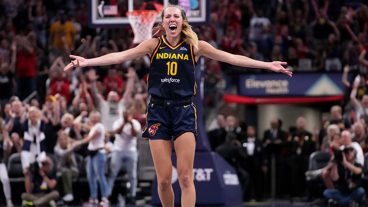 Indiana Fever defender Lexie Hull (10) celebrates after scoring a three-point field goal in the second half of a game against the Seattle Storm