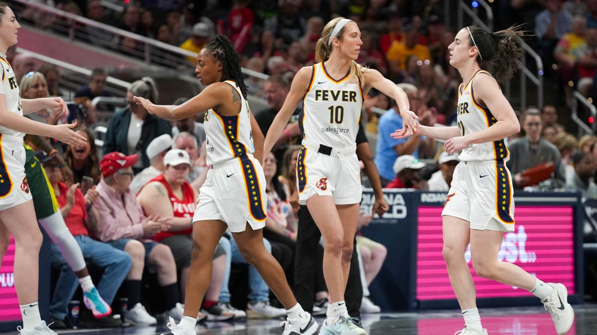 Indiana Fever guard Lexie Hull (10) low fives Indiana Fever guard Caitlin Clark (22) against the Seattle Storm on Thursday, May 30, 2024, during the WNBA game at Gainbridge Fieldhouse in Indianapolis.