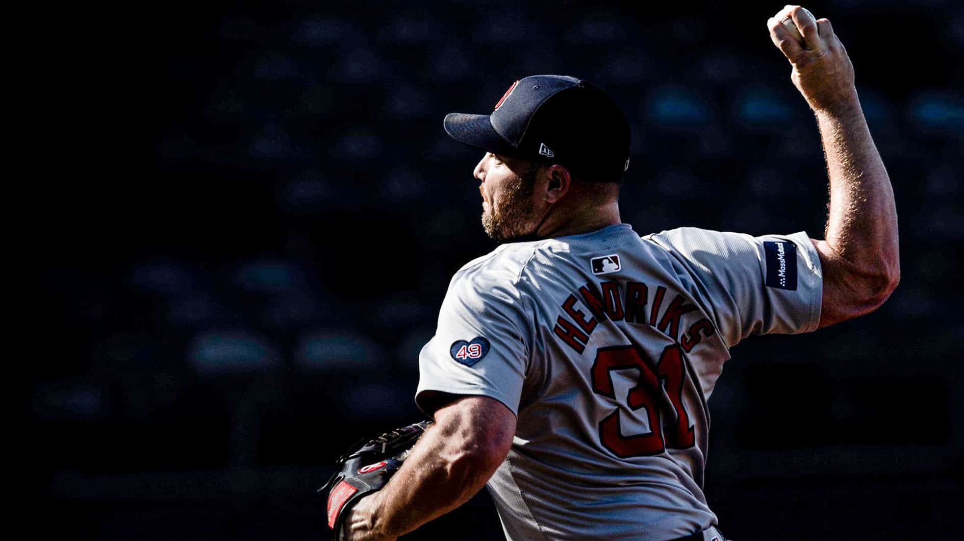 Aug 6, 2024; Kansas City, Missouri, USA; Boston Red Sox pitcher Liam Hendriks (31) warms up prior to the game against the Kansas City Royals at Kauffman Stadium. 