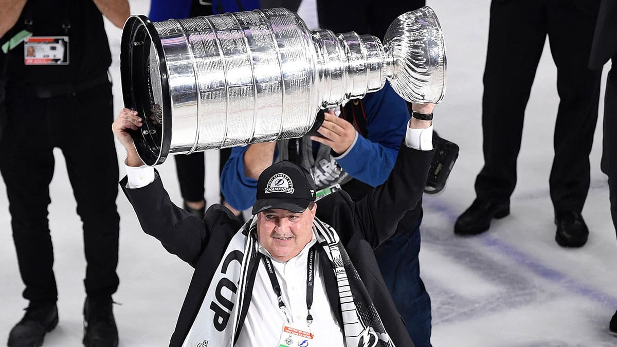 Tampa Bay Lightning owner Jeff Vinik hoists the Stanley Cup after the Lightning defeated the Montreal Canadiens 1-0 in game five to win the 2021 Stanley Cup Final at Amalie Arena.