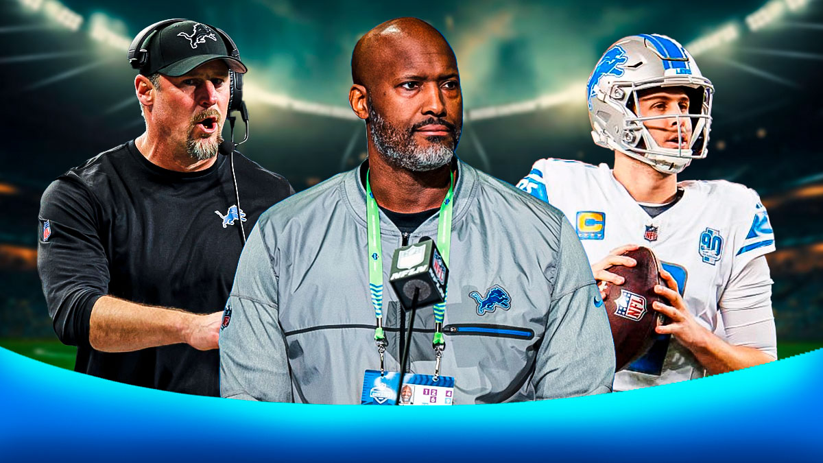 Detroit Lions general manager Brad Holmes in the center with Dan Campbell and Jared Goff on either side in front of Ford Field.