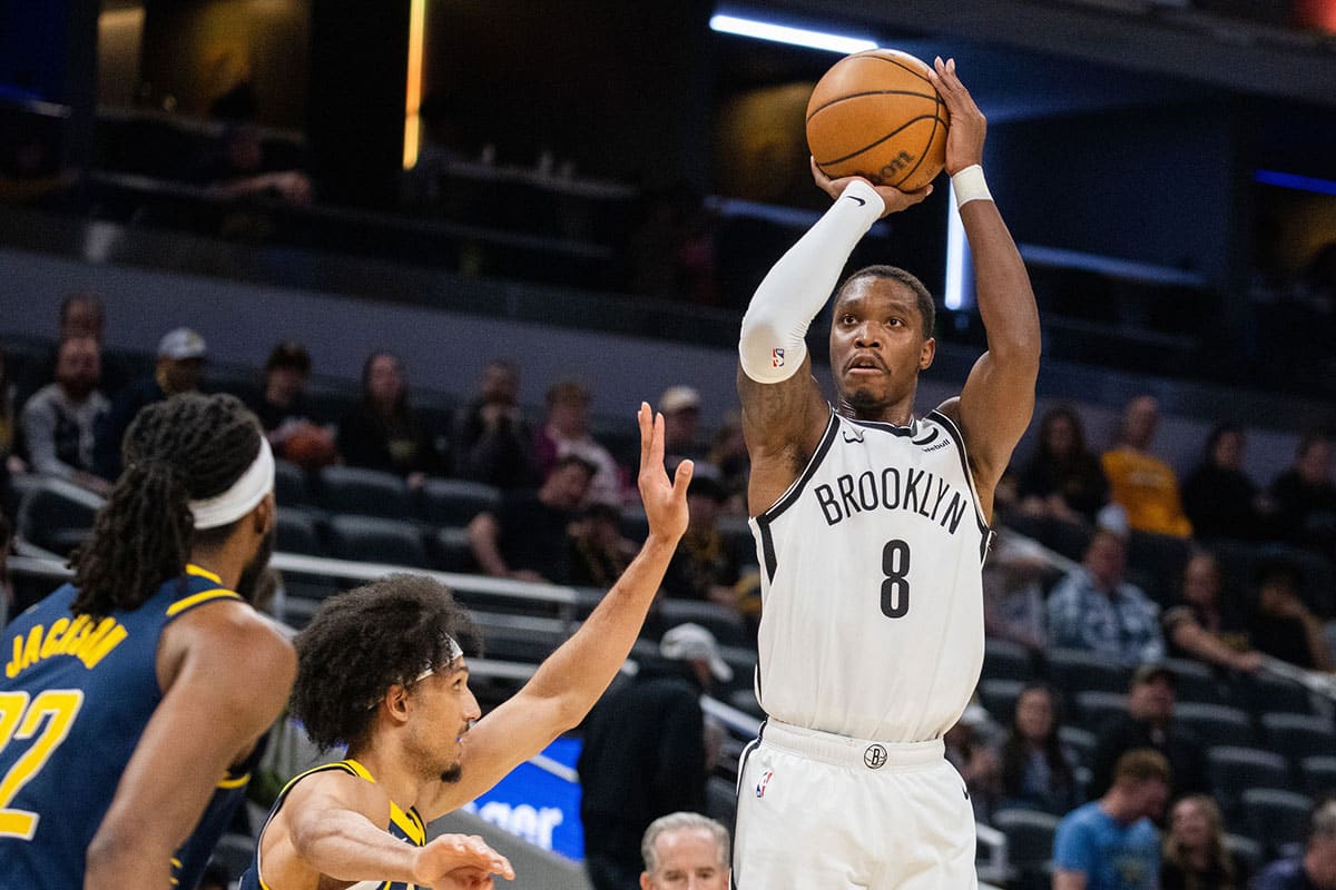  Brooklyn Nets guard Lonnie Walker IV (8) shoots the ball while Indiana Pacers guard Kendall Brown (10) defends in the second half at Gainbridge Fieldhouse.