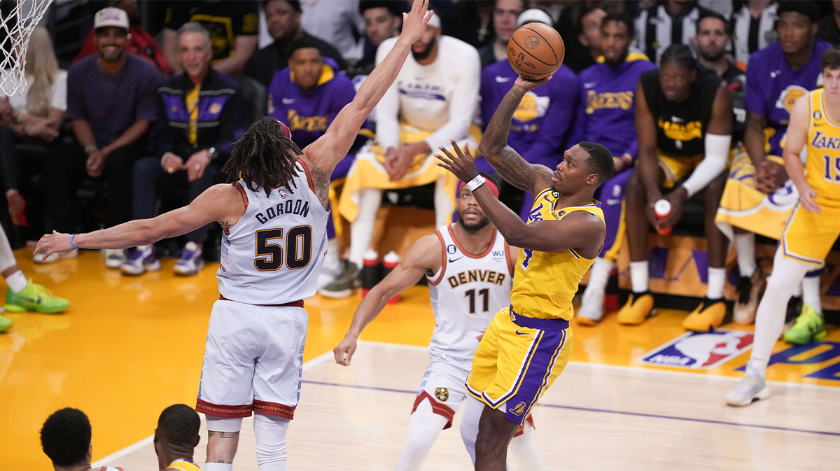 May 22, 2023; Los Angeles, California, USA; Los Angeles Lakers guard Lonnie Walker IV (4) shoots the ball against Denver Nuggets forward Aaron Gordon (50) during the second quarter in game four of the Western Conference Finals for the 2023 NBA playoffs at Crypto.com Arena. Mandatory Credit: Kirby Lee-USA TODAY Sports