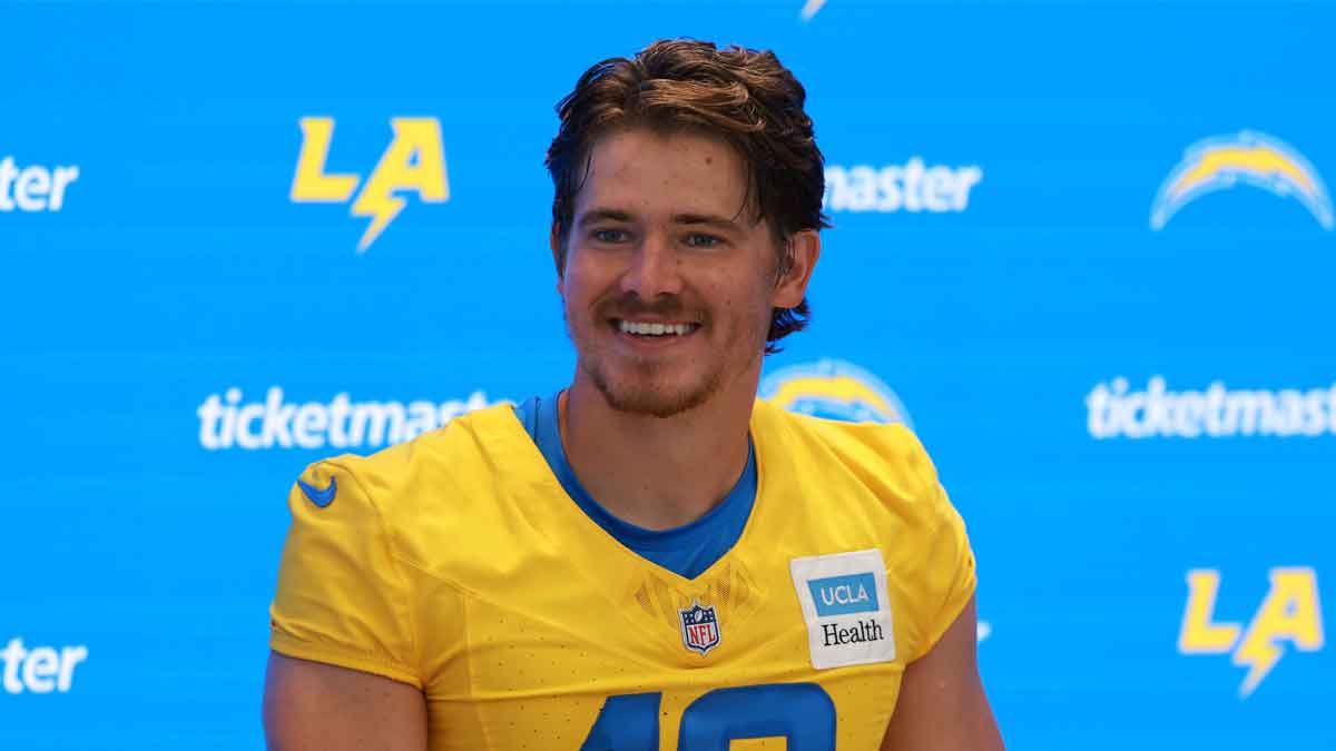 Jul 24, 2024; El Segundo, CA, USA; Los Angeles Chargers quarterback Justin Herbert (10) speaks to the media after the first day of training camp at The Bolt. Mandatory Credit: Kiyoshi Mio-USA TODAY Sports