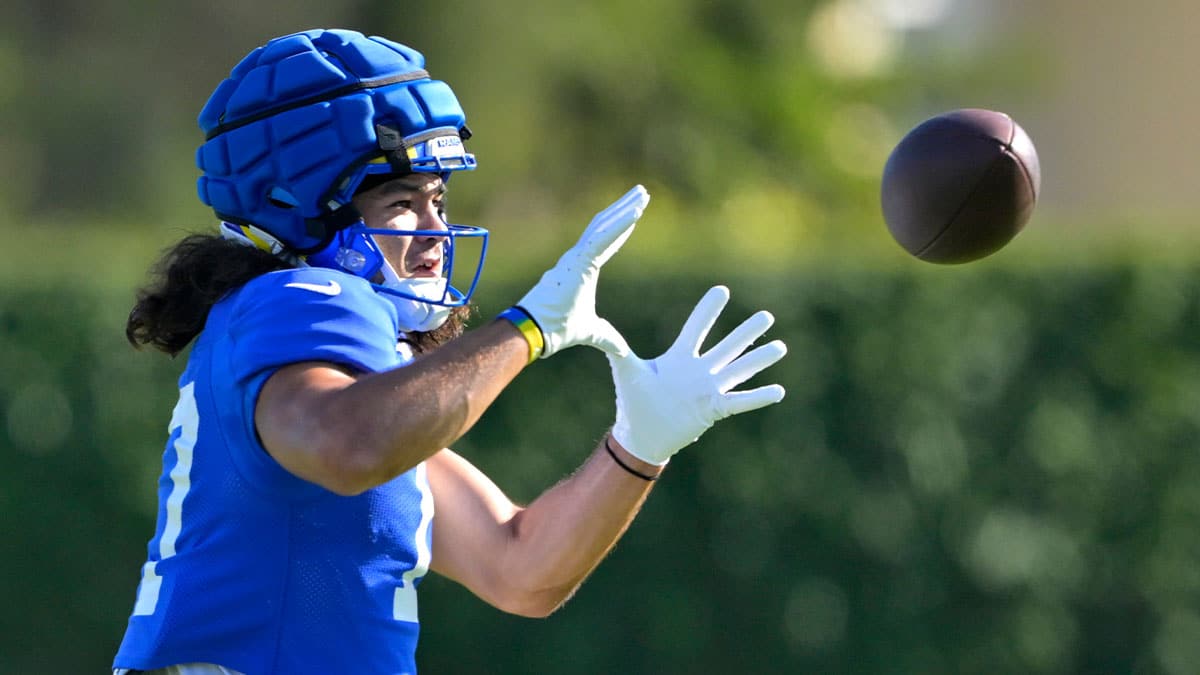 Los Angeles Rams wide receiver Puka Nacua (17) catches a pass during training camp at Loyola Marymount University. 