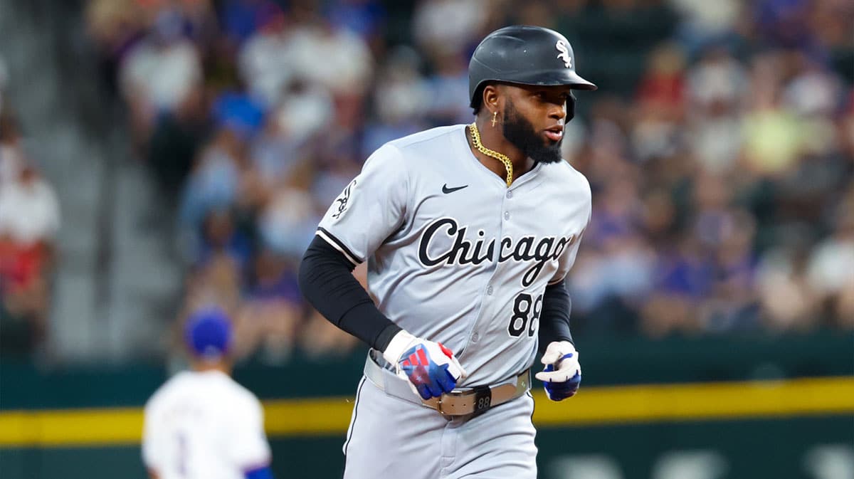 Chicago White Sox center fielder Luis Robert Jr. (88) runs the bases after hitting a home run during the third inning against the Texas Rangers at Globe Life Field.