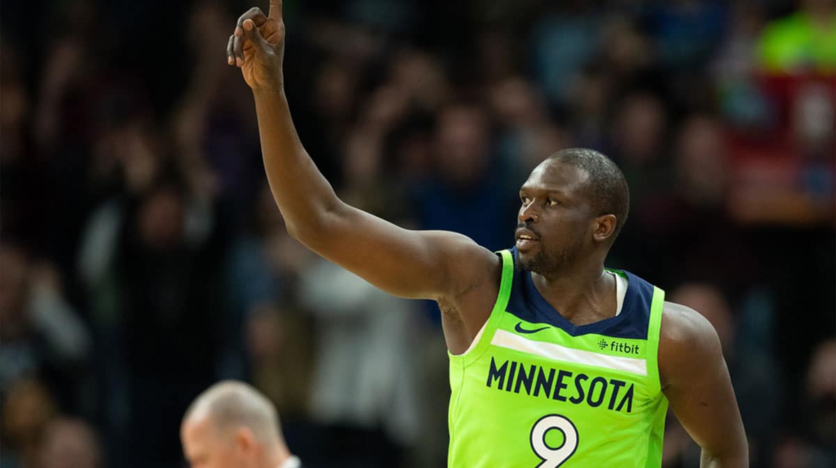 Minnesota Timberwolves forward Luol Deng (9) celebrates after scoring a three pointer against the Denver Nuggets during the third quarter at Target Center.