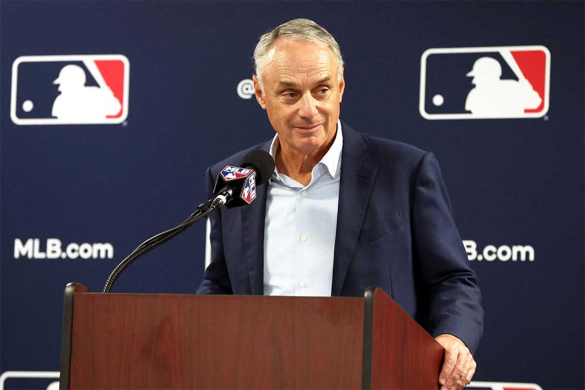 MLB commissioner Rob Manfred talks with media at George M. Steinbrenner Field.