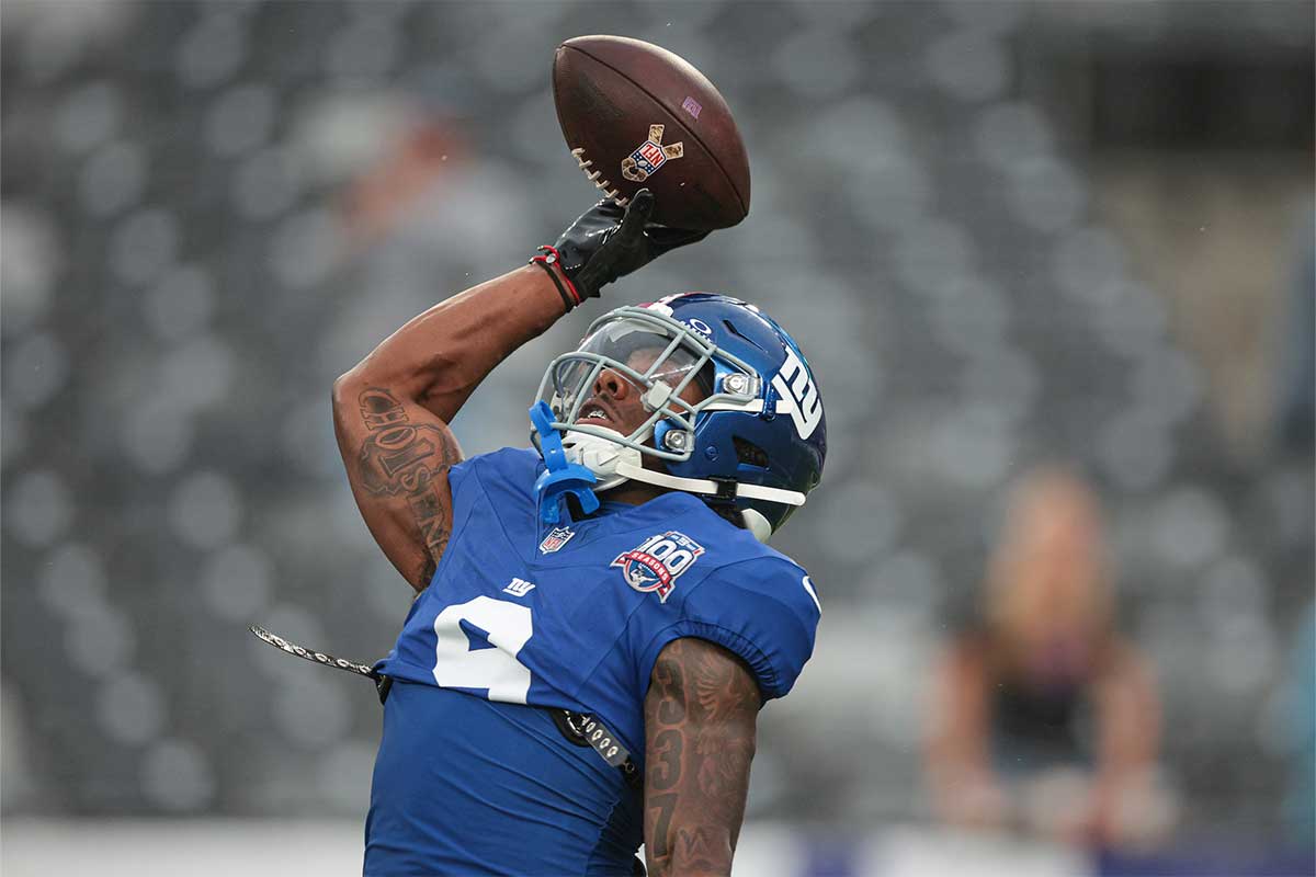  New York Giants wide receiver Malik Nabers (9) makes a catch during warm ups before the game against the Detroit Lions at MetLife Stadium.