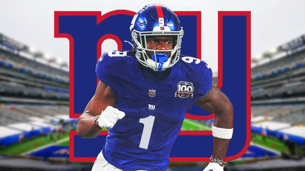 Giants WR Malik Nabers with his jersey number replaced with 1 in front of the New York Giants logo