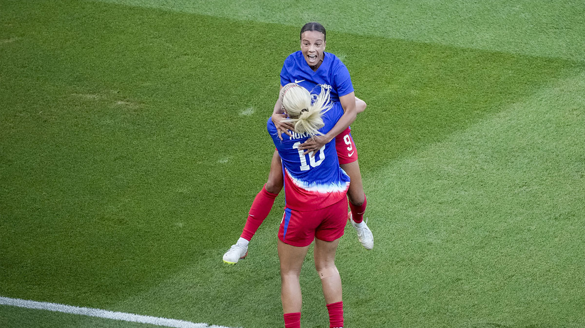 United States forward Mallory Swanson (9) celebrates with United States midfielder Lindsey Horan (10) after scoring against Team Brazil during the second half in the women's soccer gold medal match during the Paris 2024 Olympic Summer Games at Parc des Princes. 